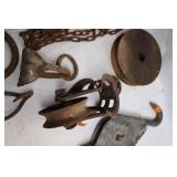 Collection of Antique Pulleys, Hooks, and Chains
