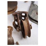 Collection of Antique Pulleys, Hooks, and Chains