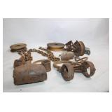 Collection of Antique Pulleys, Hooks, and Chains