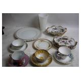 Elegant Collection of Vintage Porcelain Teacups, Saucers, and Plates