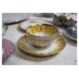 Elegant Collection of Vintage Porcelain Teacups, Saucers, and Plates