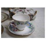 Elegant Collection of Vintage Porcelain Teacups, Saucers, and Plates