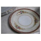 Elegant Collection of Vintage Porcelain Teacups, Saucers, and Plates