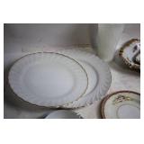Elegant Collection of Vintage Porcelain Teacups, Saucers, and Plates