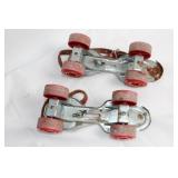 Vintage Adjustable Metal Roller Skates with Red Wheels