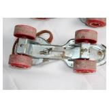Vintage Adjustable Metal Roller Skates with Red Wheels