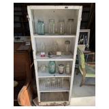 Caninet with vintage canning Jars