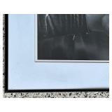 Framed Print by Jan Saudek in Black and White"Theatre of Life" Man holding a baby