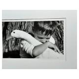 Large Black and White Framed Photographic Print of a Boy with a Goose