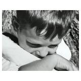 Large Black and White Framed Photographic Print of a Boy with a Goose