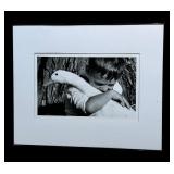 Large Black and White Framed Photographic Print of a Boy with a Goose