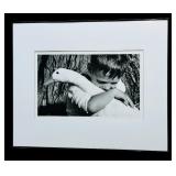 Large Black and White Framed Photographic Print of a Boy with a Goose