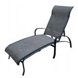 Two Outdoor Lounge Chairs and Small Table