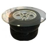 Unique Coffee Table Made with Tires and Glass Top