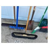 Assorted Long Handle Tools. Brooms, Shovels, Etc