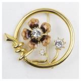 Joan Rivers Enameled Flower & Rhinestone Gold Tone Base Metal Set In Circle Brooch.