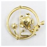 Joan Rivers Enameled Flower & Rhinestone Gold Tone Base Metal Set In Circle Brooch.