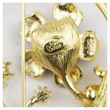 Joan Rivers Enameled Flower & Rhinestone Gold Tone Base Metal Set In Circle Brooch.