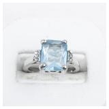 Aquamarine And CZ Silver Plated Ring. Size 6.25 - 6.5.
