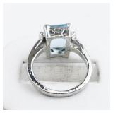 Aquamarine And CZ Silver Plated Ring. Size 6.25 - 6.5.