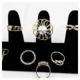 Set of ten  Gold Tone Base Metal Rings . Size 6.75-7.25.