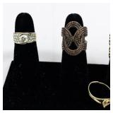 Set of Seven Gold Tone Base Metal Rings . Size 6-6.5.