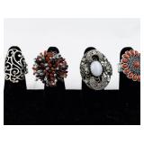 Set of seven  Silver Tone Base Metal Rings. Size 8--9.