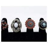 Set of seven  Silver Tone Base Metal Rings. Size 8--9.