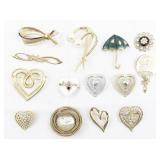 Group of Fourteen  Gold Tone Base Metal Brooches.