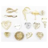 Group of Fourteen  Gold Tone Base Metal Brooches.