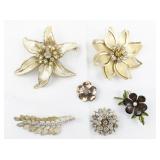 Group of 6  Gold Tone Base Metal Brooches.