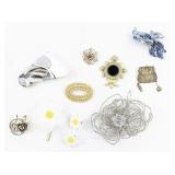 Group of 11 Base Metal Brooches.