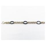 Black Gold Tone Base Metal Link Bracelet.
