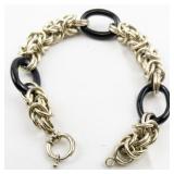 Black Gold Tone Base Metal Link Bracelet.