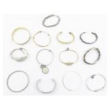 Set of thirteen  Base Metal Bangles.