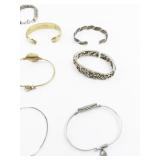 Set of thirteen  Base Metal Bangles.