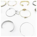 Set of thirteen  Base Metal Bangles.