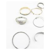 Set of thirteen  Base Metal Bangles.