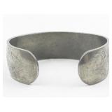 Floral Silver Tone Base Metal Bangle Bracelet.
