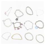 Set of twelve  Gold Tone Base Metal Bracelets.