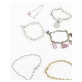 Set of twelve  Gold Tone Base Metal Bracelets.