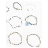 Set of twelve  Gold Tone Base Metal Bracelets.