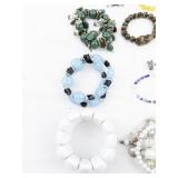 Set of nine  Bracelets .