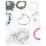 Set of nine  Bracelets .