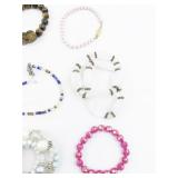 Set of nine  Bracelets .