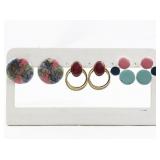 Set of three Colorful Base Metal Pierced Earrings .