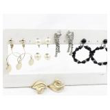 Set of eight  Gold Tone Base Metal Earrings .