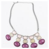 Pink Silver Tone Base Metal Bib Necklace.