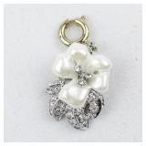 Nolan Miller White Flower silver tone Base Metal charm.