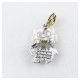 Nolan Miller White Flower silver tone Base Metal charm.